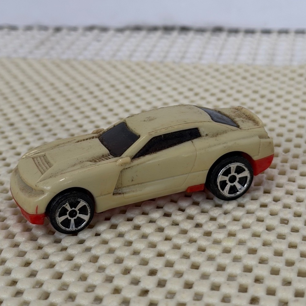 Hot Wheels Diecast Sports Car Tan with Red Base 1/64 Scale Toy Coupe